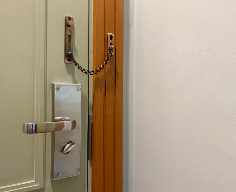 Metal door handle with lock, bolt the door background