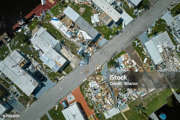 Hurricane Ian Destroyed Homes In Florida Residential Area Natural Disaster And Its Consequences Stock Photo - Download Image Now