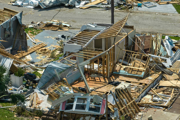 destroyed by hurricane ian suburban houses in florida mobile home residential area. consequences of natural disaster - hurricane ian stok fotoğraflar ve resimler