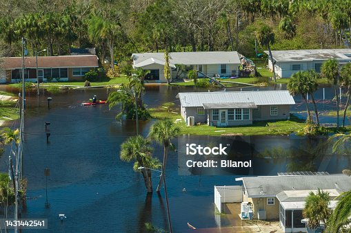 istock Surrounded by hurricane Ian rainfall flood waters homes in Florida residential area. Consequences of natural disaster 1431442541