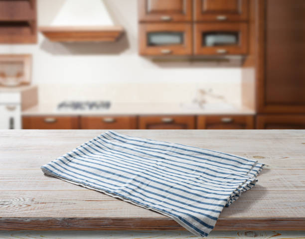 istock Napkin on wooden desk perspective. Kitchen background. 1431442620