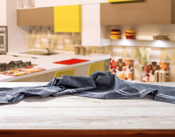 istock Napkin on wooden desk perspective. Kitchen background. 1431442625
