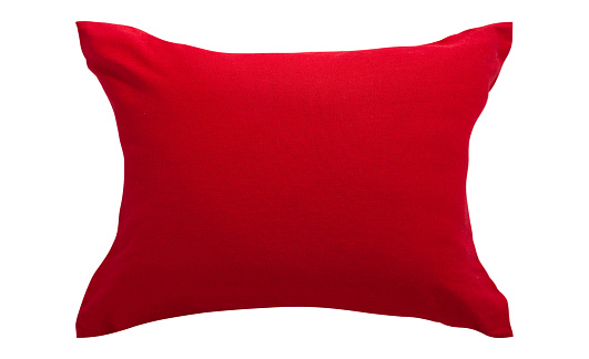 close up of a red pillow on white background