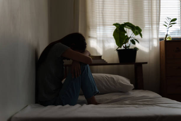 istock Depressed young woman looking thoughtful about troubles. 1431448809