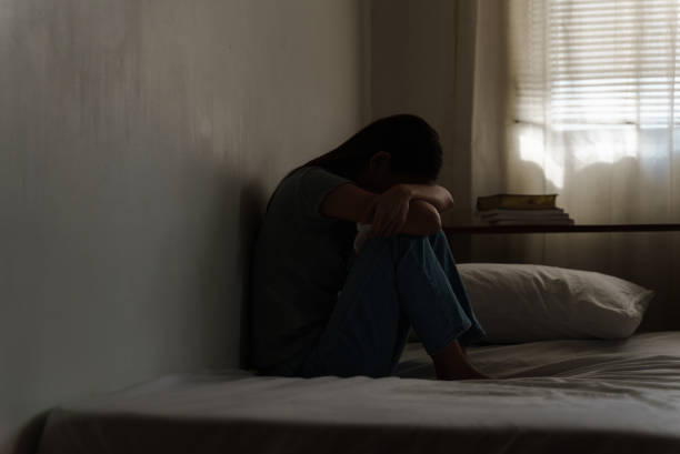 istock Depressed young woman looking thoughtful about troubles. 1431448830