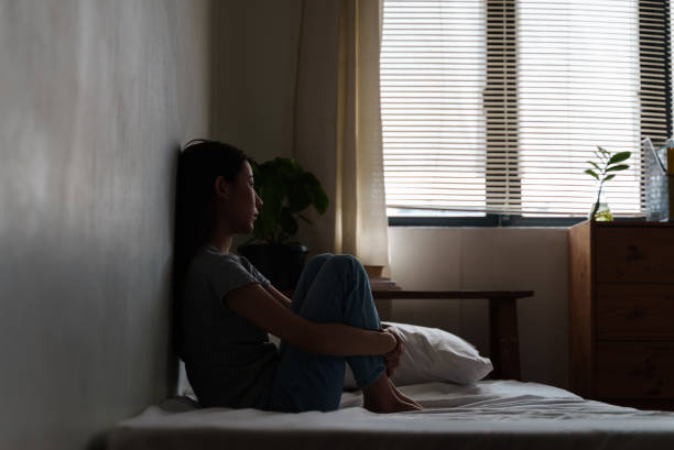 istock Depressed young woman looking thoughtful about troubles. 1431448925