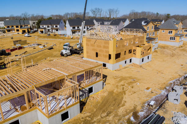 Aerial view of construction site on new modern cottages in the suburbs stock photo