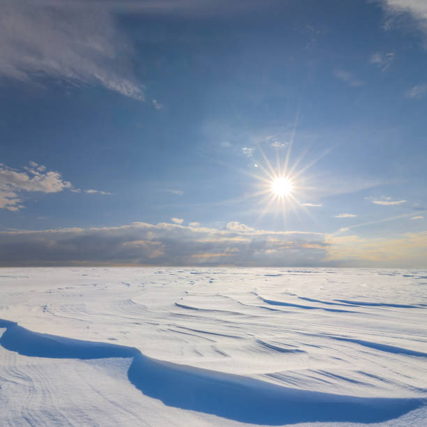 istock winter snowbound plain in light of sparkle sun 1431451532