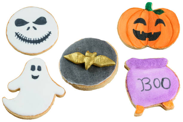 istock Several buttery cookies decorated with a halloween theme (white background). 1431453846
