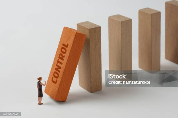 Domino Effect Control Stock Photo - Download Image Now - Abstract, Achievement, Authority