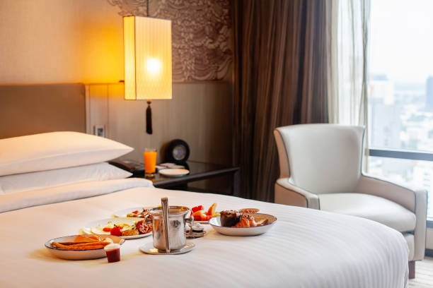 istock Breakfast in bed in hotel. Room service in modern luxury resort 1431462832