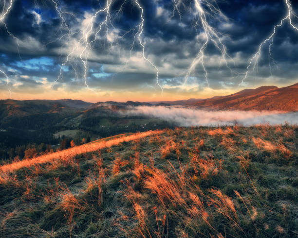 istock lightning over a hilly field. landscape with dramatic thunderclouds in the background. nature of Ukraine 1431466449