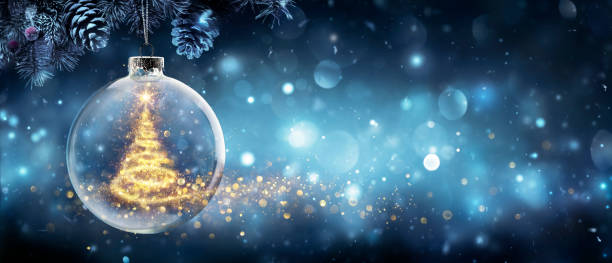 christmas tree in snow ball hanging fir branch with golden glittering on blue abstract night - fir branch imagens e fotografias de stock