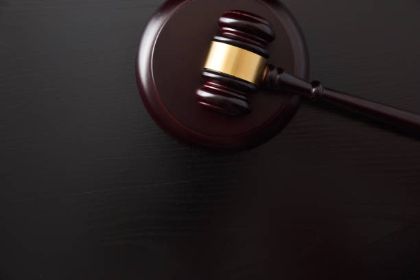 istock Judge gavel background on black table top view 1431476022