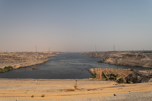 A view of the Nile River from the High Dam in Aswan, Egypt on a clear day.