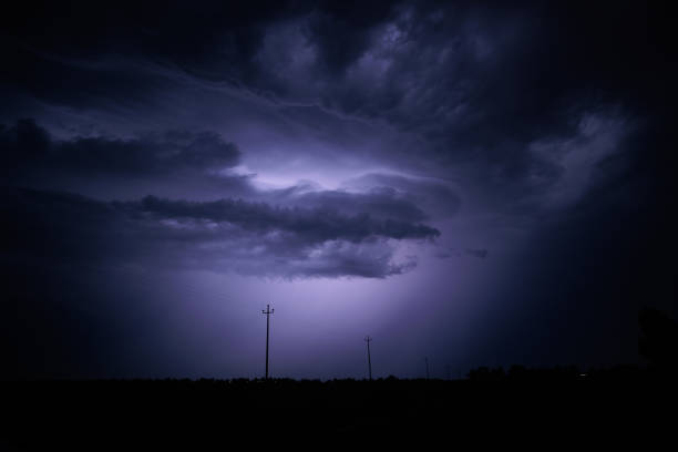 istock majestic and impressive purple lightning bursting inside a storm cloud at night, highlighting its shapes 1431485501
