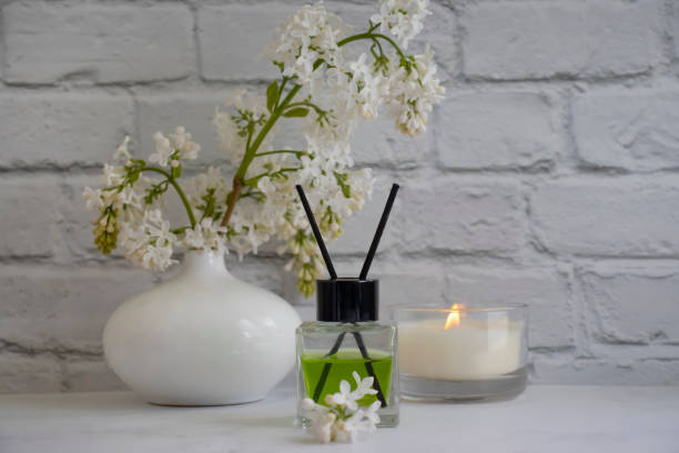 istock Perfume for home, flower, candle on a light background 1431487155