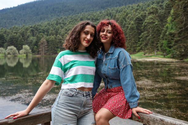 Two young girls having fun in nature