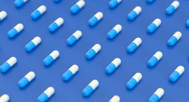 istock Blue Medicine capsule pills isolated on white background. Medicine, pharmacy concept. 1431496519