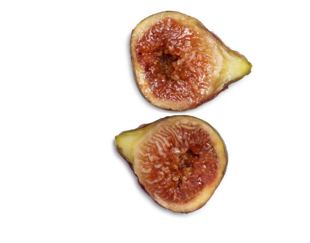 istock Ripe figs on a white background.  Southern fruit isolate. Sliced purple fruit. Healthy diet. 1431498275