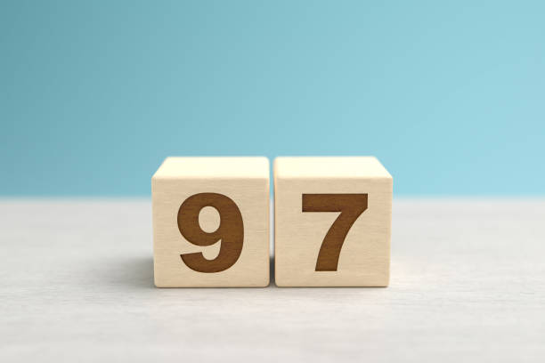 istock Wooden toy blocks forming the number 97. 1431498418