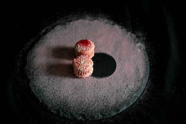 istock A set of two pink colored strawberry macaroons 1431520240