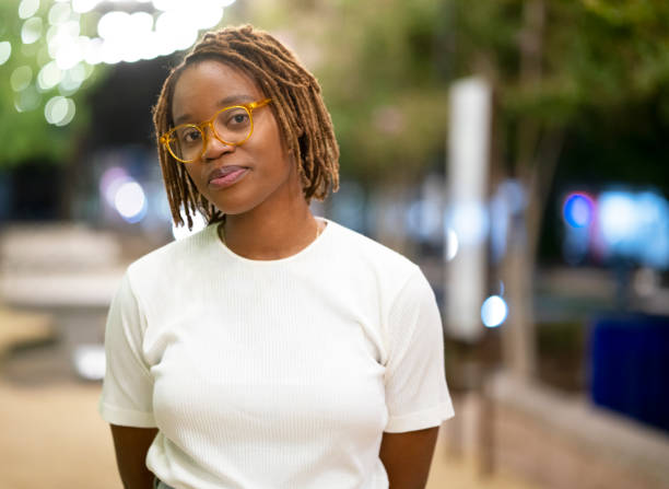 istock Smiling young black woman outdoors 1431533342