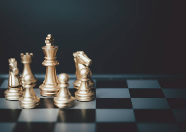 istock Strategy and business planning ideas. Chess gold on the board. 1431548299