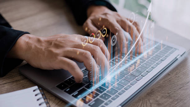 istock people using tablets And using his finger to touch the screen With a business graph showing up in a virtual screen.New startup ideas and business growth concept. 1431548903