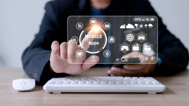 istock mobile apps concept.Business man hands holding touch screen smartphone outside in the park,color filter,all element graphic are made up by me 1431548961