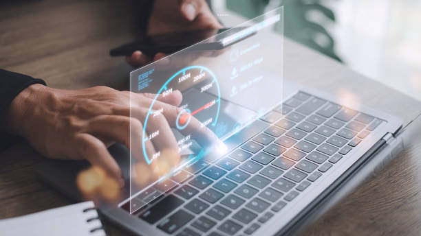 istock Fast internet connection with Metaverse technology concept, Hand holding smartphone and Virtual screen of Internet speed measurement, Internet and technology concept, 5G Hi speed internet concept 1431548990