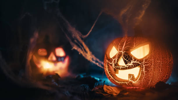 istock scary halloween pumpkins in the night 1431551499