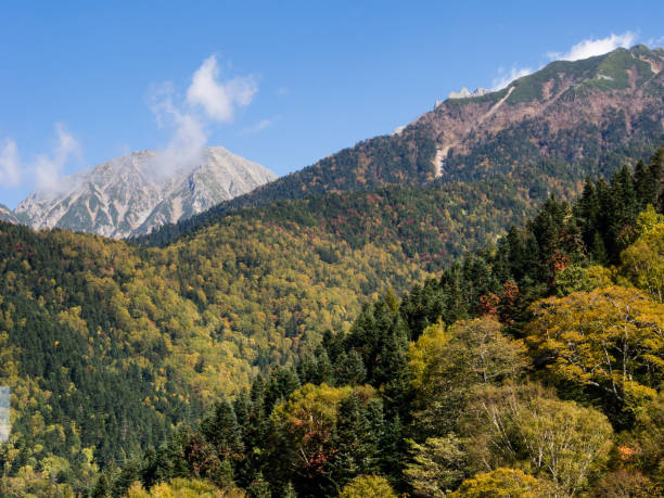 Early fall colors in Japanese Alps - view from Shin-Hotaka ropeway in Gifu prefecture, Japan stock photo