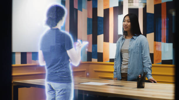 istock Asian girl talks on call with friend using augmented reality software VFX holographic effect 1431554271