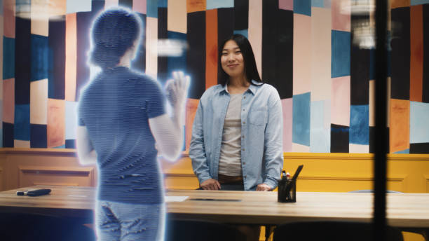istock Asian girl talks on call with friend using augmented reality software VFX holographic effect 1431555153