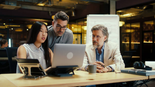 istock Team discussing business strategy in office 1431558665