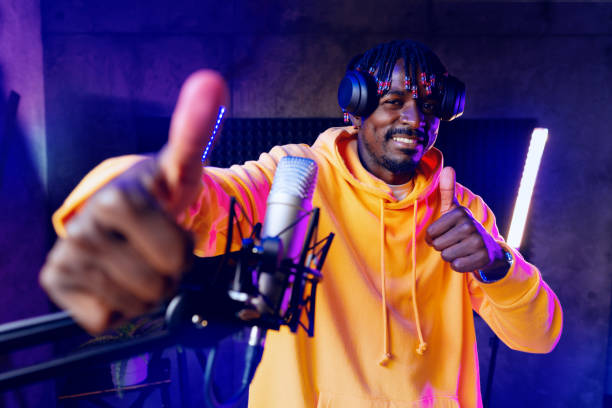 istock Young African performer recording his new track in recording studio 1431558823