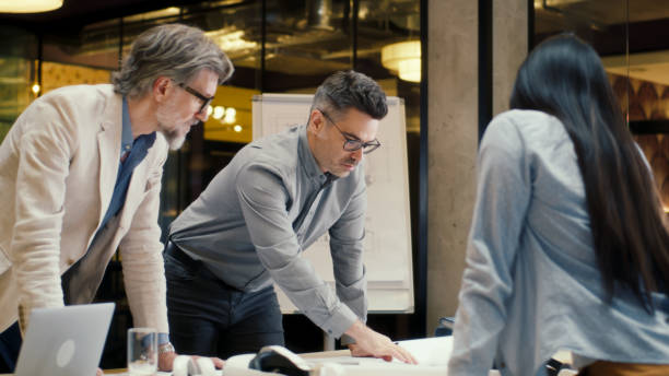 istock Office workers discussing business strategy at meeting 1431559350