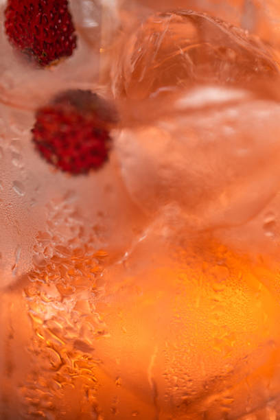 istock Red drink cocktail or lemonade on the pink background 1431559390