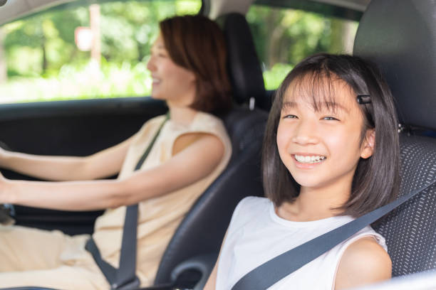 istock asian mother and daughter in a car 1431559811