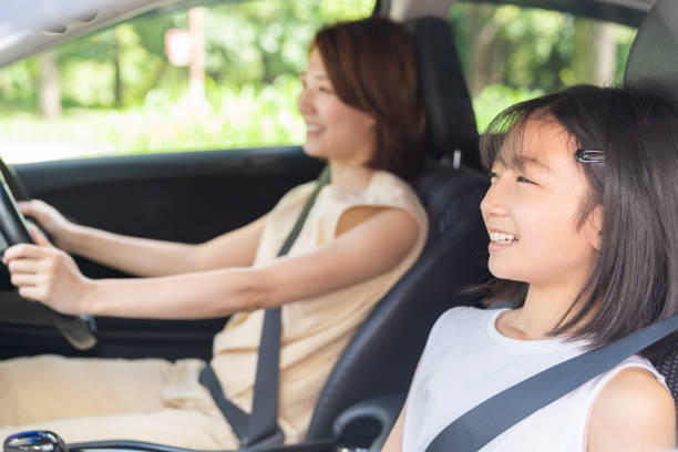 istock asian mother and daughter in a car 1431559988
