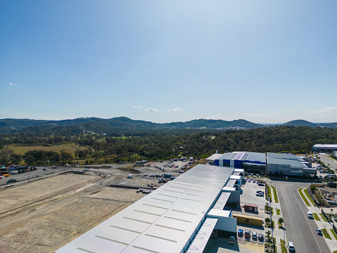 Aerial view of light industrial development and warehouses in south-east Queensland