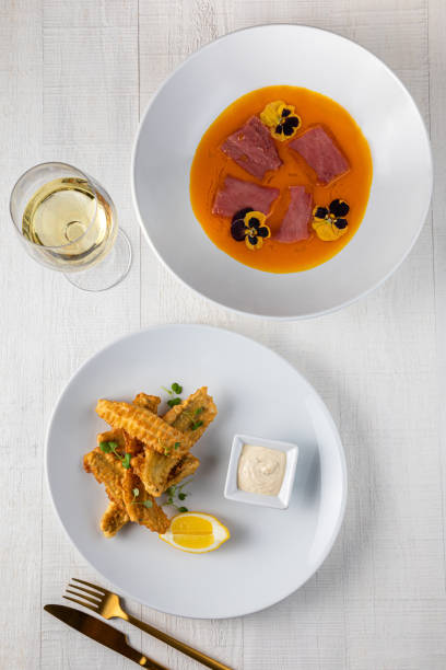 istock Pasta with ham, Grilled sliced Beef Steak with sauce, White plate with fork 1431568276