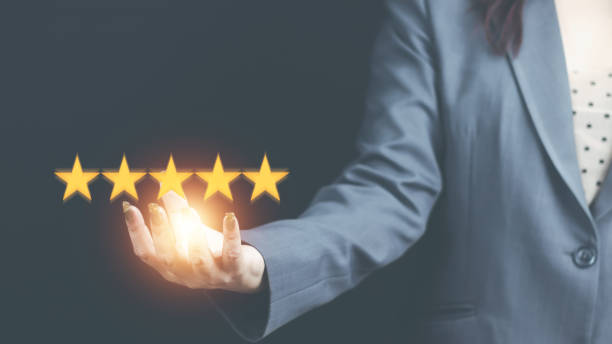 istock Customer service and Satisfaction concept women's hands doing online assessments in the satisfaction rating the popular service company allows customers in order to improve and develop the organizatio 1431569311