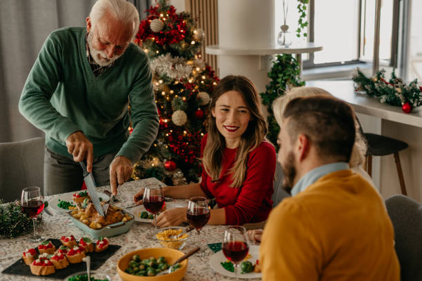 istock Grandfather Serving Turkey 1431574381