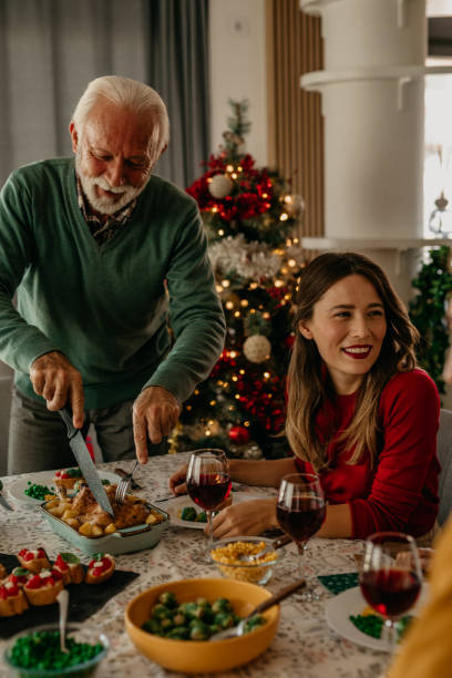 istock Grandfather Serving Turkey 1431574383