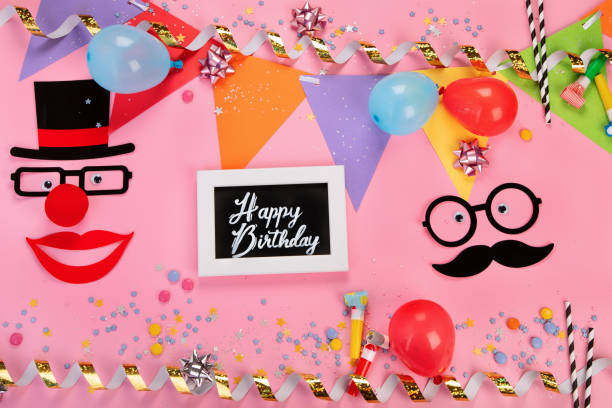 istock Funny faces on party pink background. 1431581440