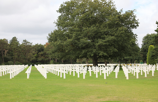 Colleville-sur-Mer, FRA, France - August 21, 2022: White crosses in the American Military Cemetery near D-Day Landing
