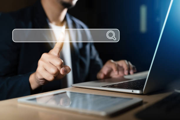 istock Searching Browsing Internet Data Information with blank search bar. business people working with computer for finding data. 1431586909