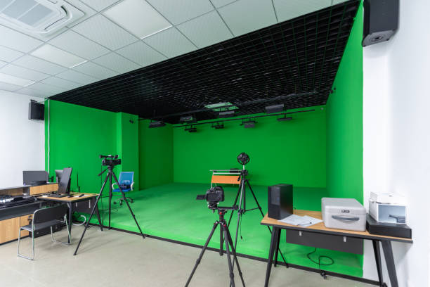 Green background studio of film and television companies Green background studio of film and television companies post production house stock pictures, royalty-free photos & images